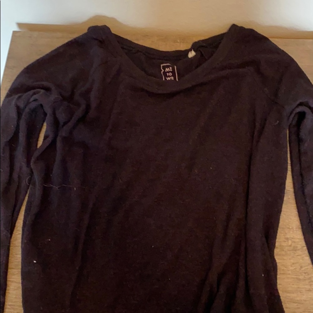Dark red sweater.